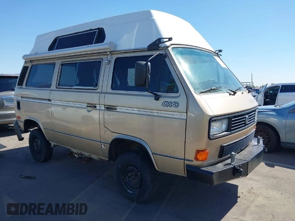 1987 Volkswagen Vanagon with VIN WV2YB0252HG069458, listed as a IAAI auction lot 41945327 with Not Provided miles and . Bid and sale history available at DreamBid. Image 1.
