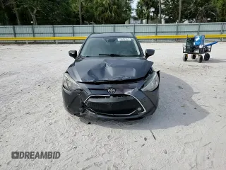 2019 Toyota Yaris L z VIN 3MYDLBYV0KY500741, wystawiony jako Copart lot #53882565 z przebiegiem 118 190 mil mil oraz Nie do naprawy • Non repairable. Historia ofert i sprzedaży dostępna na DreamBid. Obrazek 13.