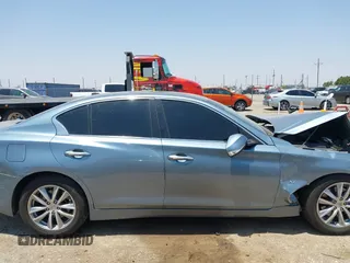 2015 Infiniti Q50 z VIN JN1BV7AP2FM357716, wystawiony jako IAAI lot #42504273 z przebiegiem 74 608 mil mil oraz . Historia ofert i sprzedaży dostępna na DreamBid. Obrazek 14.