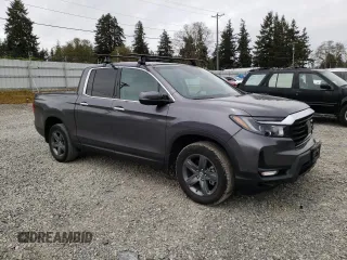 2021 Honda Ridgeline RTL-E with VIN 5FPYK3F71MB016967, listed as a Copart auction lot 53371544 with 34,382 mi miles and Salvage title. Bid and sale history available at DreamBid. Image 4.