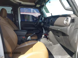 2021 Jeep Gladiator Rubicon with VIN 1C6JJTBG4ML536085, listed as a IAAI auction lot 41898204 with 39,627 mi miles and . Bid and sale history available at DreamBid. Image 5.