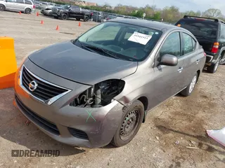 2014 Nissan Versa S Plus with VIN 3N1CN7APXEL850427, listed as a IAAI auction lot 41941915 with 65,155 mi miles. Bid and sale history available at carsss.com. Image 2.