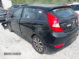 2015 Hyundai Accent Sport with VIN KMHCU5AE5FU233054, listed as a IAAI auction lot 41932298 with 70,278 mi miles. Bid and sale history available at carsss.com. Image 3.