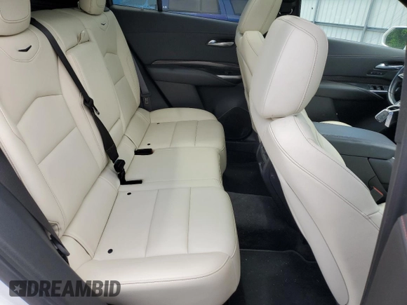 2019 Cadillac XT4 FWD Sport with VIN 1GYFZER44KF210582, listed as a Copart auction lot 61272015 with 104,073 mi miles and Salvage title. Bid and sale history available at DreamBid. Image 11.