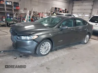 2015 Ford Fusion S Hybrid with VIN 3FA6P0UU8FR178675, listed as a IAAI auction lot 42104712 with 129,998 mi miles. Bid and sale history available at carsss.com. Image 17.