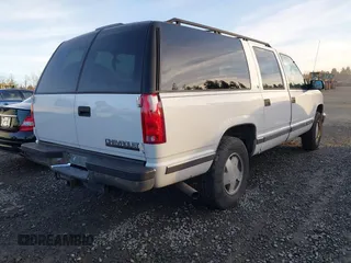 1997 Chevrolet Suburban with VIN 3GNFK16RXVG102805, listed as a IAAI auction lot 41559415 with 1 mi miles. Bid and sale history available at carsss.com. Image 4.