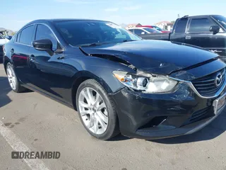 2017 Mazda Mazda6 Touring with VIN JM1GL1V55H1155696, listed as a IAAI auction lot 42003172 with 95,300 mi miles. Bid and sale history available at carsss.com. Image 6.
