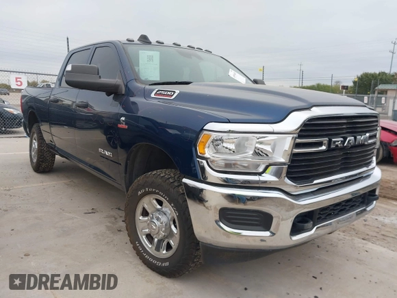 2021 Ram 2500 Tradesman with VIN 3C6UR5CL4MG584602, listed as a IAAI auction lot 40994669 with 68,000 mi miles. Bid and sale history available at carsss.com. Image 1.
