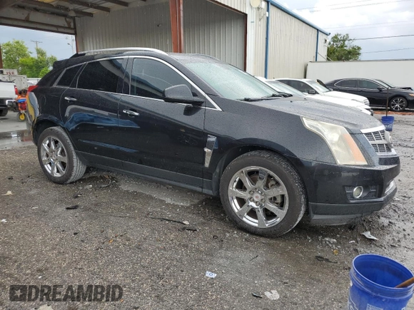2012 Cadillac SRX Performance Collection z VIN 3GYFNBE38CS500845, wystawiony jako Copart lot #60410635 z przebiegiem 164 217 mil mil oraz Szkoda całkowita • Salvage title. Historia ofert i sprzedaży dostępna na DreamBid. Obrazek 4.