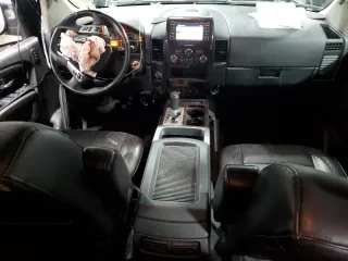 2015 Nissan Titan SV with VIN 1N6AA0EC9FN510828, listed as a Copart auction lot 43855205 with 63,512 mi miles and Salvage title. Bid and sale history available at DreamBid. Image 8.