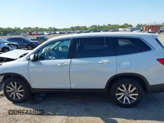 2021 Honda Pilot EX-L with VIN 5FNYF5H53MB006638, listed as a IAAI auction lot 41994463 with 101,786 mi miles. Bid and sale history available at carsss.com. Image 14.