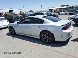 2019 Dodge Charger SRT Hellcat with VIN 2C3CDXL96KH588025, listed as a Copart auction lot 64705614 with 49,659 mi miles and Salvage Title. Bid and sale history available at DreamBid. Image 2.