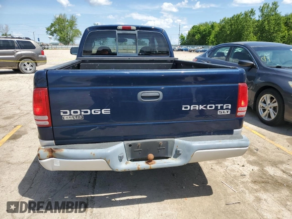 2003 Dodge Dakota SLT z VIN 1D7HL42N33S237980, wystawiony jako Copart lot #55276095 z przebiegiem 97 471 mil mil oraz Tytuł czysty. Historia ofert i sprzedaży dostępna na DreamBid. Obrazek 6.