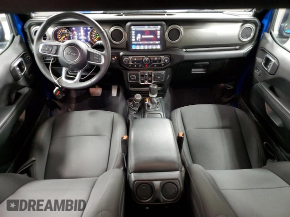 2023 Jeep Gladiator Overland z VIN 1C6HJTFG6PL564337, wystawiony jako Copart lot #59620315 z przebiegiem 31 552 mil mil oraz Czysty tytuł • Clean title. Historia ofert i sprzedaży dostępna na DreamBid. Obrazek 8.