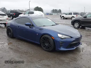 2017 Toyota 86 with VIN JF1ZNAA12H9703408, listed as a IAAI auction lot 41311374 with 90,661 mi miles. Bid and sale history available at carsss.com. Image 1.