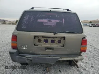 1995 Jeep Grand Cherokee Laredo with VIN 1J4GZ58S7SC743239, listed as a Copart auction lot 81717114 with 254,061 mi miles and Salvage Title. Bid and sale history available at carsss.com. Image 6.