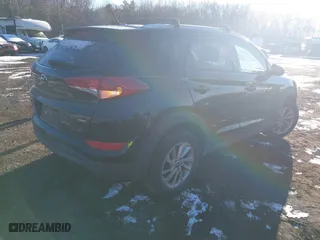 2016 Hyundai Tucson SE with VIN KM8J3CA42GU076476, listed as a IAAI auction lot 41272580 with 112,010 mi miles. Bid and sale history available at carsss.com. Image 4.
