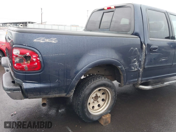 2003 Ford F-150 XLT with VIN 1FTRW08L33KC62060, listed as a IAAI auction lot 41618936 with 276,251 mi miles. Bid and sale history available at carsss.com. Image 6.