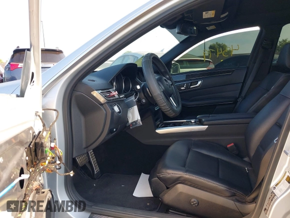 2014 Mercedes-Benz E 350 Sport with VIN WDDHF5KB0EA998283, listed as a IAAI auction lot 42743479 with 101,900 mi miles and . Bid and sale history available at DreamBid. Image 5.