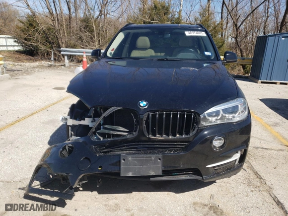 2015 BMW X5 xDrive35i with VIN 5UXKR0C56F0K54440, listed as a Copart auction lot 48974085 with 70,770 mi miles and Salvage Title. Bid and sale history available at carsss.com. Image 5.