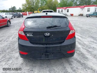 2014 Hyundai Accent GS with VIN KMHCT5AE7EU164658, listed as a IAAI auction lot 41911092 with 132,442 mi miles. Bid and sale history available at carsss.com. Image 16.