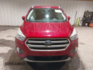 2017 Ford Escape Titanium z VIN 1FMCU9J9XHUC20359, wystawiony jako IAAI lot #41938688 z przebiegiem 79 743 mil mil oraz . Historia ofert i sprzedaży dostępna na DreamBid. Obrazek 12.