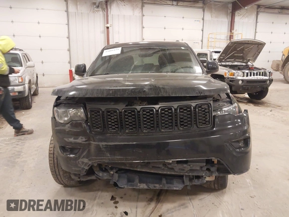 2018 Jeep Grand Cherokee Laredo E with VIN 1C4RJFAG5JC417701, listed as a IAAI auction lot 42001159 with 110,767 mi miles and . Bid and sale history available at DreamBid. Image 12.