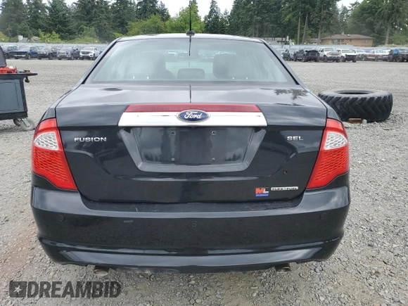 2012 Ford Fusion SEL z VIN 3FAHP0JG2CR433596, wystawiony jako Copart lot #59769105 z przebiegiem 126 230 mil mil oraz Czysty tytuł • Clean title. Historia ofert i sprzedaży dostępna na DreamBid. Obrazek 6.