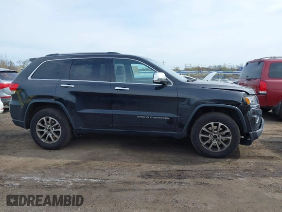 2014 Jeep Grand Cherokee Limited with VIN 1C4RJFBG4EC220054, listed as a IAAI auction lot 42050036 with 100,552 mi miles and . Bid and sale history available at DreamBid. Image 13.