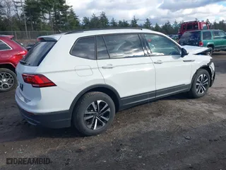 2024 Volkswagen Tiguan S with VIN 3VVRB7AXXRM146228, listed as a IAAI auction lot 40992502 with 2,392 mi miles. Bid and sale history available at carsss.com. Image 4.