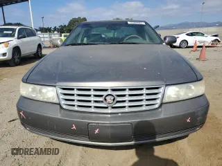 1998 Cadillac Seville SLS z VIN 1G6KS54YXWU931108, wystawiony jako Copart lot #72369984 z przebiegiem 103 267 mil mil oraz Szkoda całkowita • Salvage title. Historia ofert i sprzedaży dostępna na DreamBid. Obrazek 5.