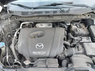 2014 Mazda CX-5 Touring with VIN JM3KE2CY9E0317278, listed as a IAAI auction lot 41991778 with 130,122 mi miles. Bid and sale history available at carsss.com. Image 10.