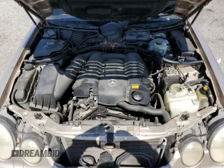 2000 Mercedes-Benz E-Class AWD with VIN WDBJH82J8YX042547, listed as a Copart auction lot 58063494 with 138,392 mi miles and Salvage Title. Bid and sale history available at carsss.com. Image 11.