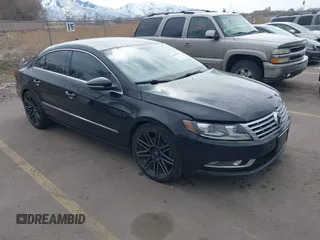 2014 Volkswagen CC R-Line with VIN WVWBP7ANXEE502502, listed as a IAAI auction lot 41835473 with 145,885 mi miles and . Bid and sale history available at DreamBid. Image 1.