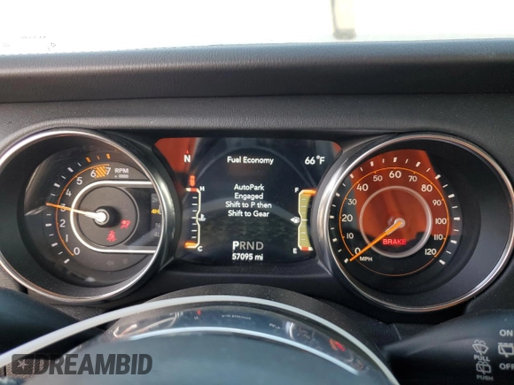 2019 Jeep Wrangler Unlimited Sahara with VIN 1C4HJXEN0KW616942, listed as a Copart auction lot 63501755 with 57,095 mi miles and Salvage title. Bid and sale history available at DreamBid. Image 9.