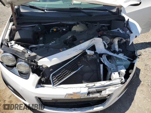 2016 Chevrolet Sonic LT z VIN 1G1JC6SHXG4175711, wystawiony jako Copart lot #55358605 z przebiegiem 59 422 mil mil oraz Szkoda całkowita • Salvage title. Historia ofert i sprzedaży dostępna na DreamBid. Obrazek 11.
