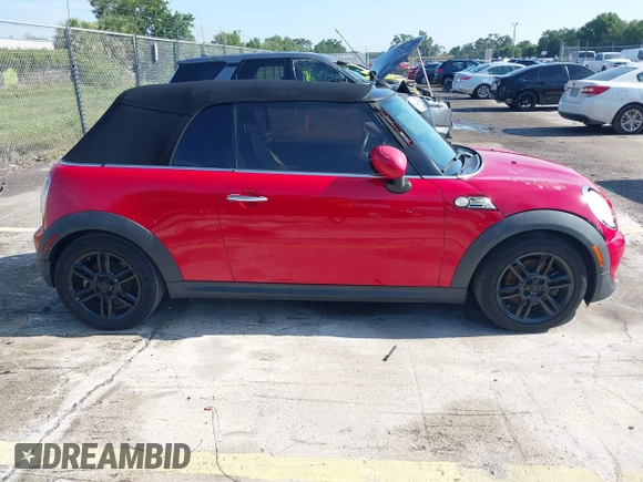 2014 MINI Convertible S с VIN WMWZP3C50ET298497, выставлен на аукционе IAAI как лот 42345812 с пробегом 119 921 миль миль и . История ставок и продаж доступна на DreamBid. Изображение 13.