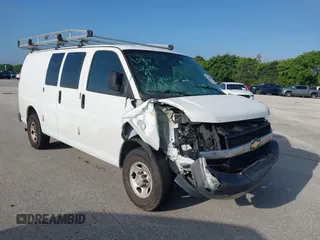 2019 Chevrolet Express Cargo Van with VIN 1GCWGAFG5K1254736, listed as a IAAI auction lot 41880050 with 136,132 mi miles. Bid and sale history available at carsss.com. Image 1.