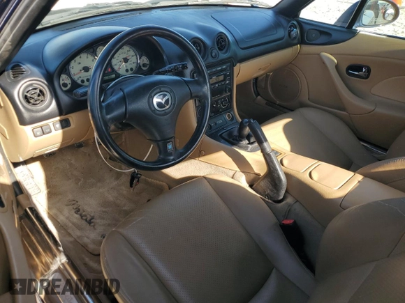2002 Mazda MX-5 Miata Cloth z VIN JM1NB353720231873, wystawiony jako Copart lot #52398015 z przebiegiem 90 077 mil mil oraz Szkoda całkowita • Salvage title. Historia ofert i sprzedaży dostępna na DreamBid. Obrazek 8.