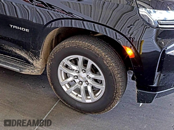 2022 Chevrolet Tahoe LS z VIN 1GNSKMKD7NR129745, wystawiony jako IAAI lot #42566236 z przebiegiem 95 126 mil mil oraz . Historia ofert i sprzedaży dostępna na DreamBid. Obrazek 24.