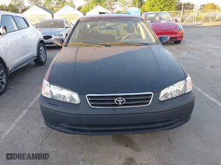 2000 Toyota Camry CE with VIN 4T1BG22K9YU688451, listed as a IAAI auction lot 42066777 with 210,221 mi miles. Bid and sale history available at carsss.com. Image 6.