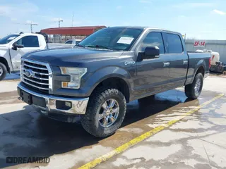 2015 Ford F-150 XLT w/HD Payload Pkg with VIN 1FTFW1EF7FKD04869, listed as a IAAI auction lot 41664736 with 165,784 mi miles. Bid and sale history available at carsss.com. Image 2.