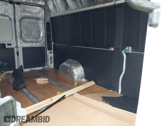 2023 Ram ProMaster Cargo with VIN 3C6MRVJG5PE511969, listed as a IAAI auction lot 40445544 with 220,363 mi miles and . Bid and sale history available at DreamBid. Image 8.
