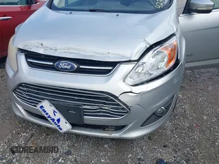 2013 Ford C-Max SEL z VIN 1FADP5BU6DL504301, wystawiony jako IAAI lot #42366960 z przebiegiem 239 190 mil mil oraz . Historia ofert i sprzedaży dostępna na DreamBid. Obrazek 16.