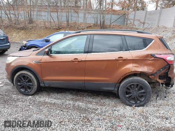 2017 Ford Escape SE with VIN 1FMCU9G96HUC12475, listed as a IAAI auction lot 41741342 with 102,823 mi miles. Bid and sale history available at carsss.com. Image 15.