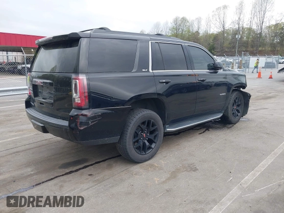 2017 GMC Yukon SLT with VIN 1GKS1BKC2HR128308, listed as a IAAI auction lot 41945770 with 158,905 mi miles. Bid and sale history available at carsss.com. Image 4.