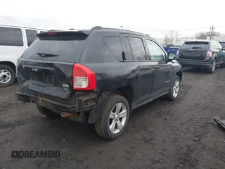2013 Jeep Compass Latitude with VIN 1C4NJDEB3DD221904, listed as a IAAI auction lot 41691631 with 134,683 mi miles. Bid and sale history available at carsss.com. Image 4.