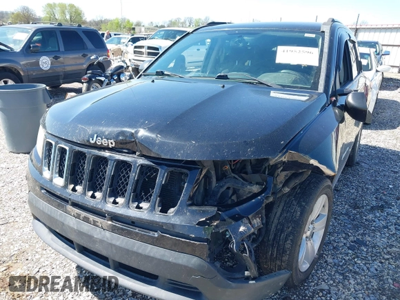 2014 Jeep Compass Sport with VIN 1C4NJCBA0ED510942, listed as a IAAI auction lot 41952596 with 196,030 mi miles and . Bid and sale history available at DreamBid. Image 6.
