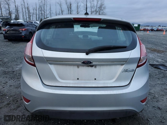 2018 Ford Fiesta S with VIN 3FADP4TJ9JM147463, listed as a Copart auction lot 85312404 with 31,386 mi miles and Salvage title. Bid and sale history available at DreamBid. Image 6.