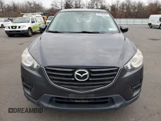 2016 Mazda CX-5 Sport with VIN JM3KE2BE8G0761648, listed as a Copart auction lot 81750854 with 191,384 mi miles and Clean Title. Bid and sale history available at DreamBid. Image 5.